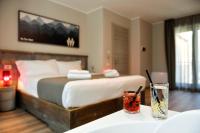 Posteľ alebo postele v izbe v ubytovaní Du Parc Hotel