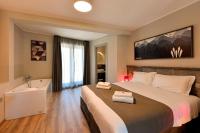 Posteľ alebo postele v izbe v ubytovaní Du Parc Hotel