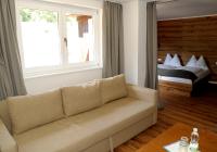 A bed or beds in a room at Villa Bucher - Metnitztalerhof