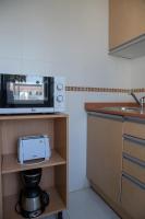 A kitchen or kitchenette at Fuentepark Apartments