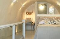 Posteľ alebo postele v izbe v ubytovaní Esperia Luxury Suites