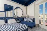 A bed or beds in a room at Maison Il Conservatorio