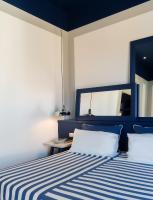 A bed or beds in a room at Maison Il Conservatorio