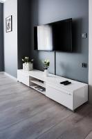 Televízia a/alebo spoločenská miestnosť v ubytovaní Apartamenty France Faktura VAT
