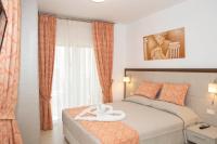Posteľ alebo postele v izbe v ubytovaní Haraki Bay Hotel and Luxury Apartments