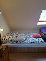 Postel nebo postele na pokoji v ubytování Pokoje nad Rabą