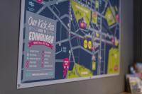 a poster of a subway map on a wall at Kick Ass Greyfriars (18+) in Edinburgh