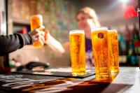 three glasses of beer sitting on a table at Kick Ass Greyfriars (18+) in Edinburgh