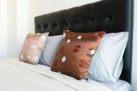 Postel nebo postele na pokoji v ubytování Cozy SeaSaran