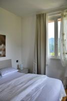 Posteľ alebo postele v izbe v ubytovaní Casa la Pianca