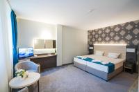 Postel nebo postele na pokoji v ubytování Family Park Hotel Kyoshkove