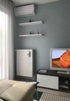 Televízia a/alebo spoločenská miestnosť v ubytovaní Luna apartment