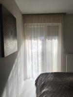 Posteľ alebo postele v izbe v ubytovaní Luna apartment