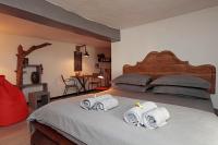 A bed or beds in a room at Vittorio 21