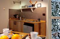 A kitchen or kitchenette at Vittorio 21