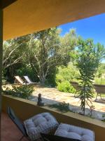 A balcony or terrace at Domus Carlotta Apartment with sea view Villasimius