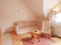 A seating area at Lola Apartman