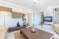 Televízia a/alebo spoločenská miestnosť v ubytovaní Apartment DARIO