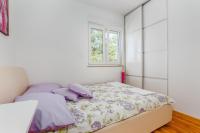 Posteľ alebo postele v izbe v ubytovaní Apartment DARIO