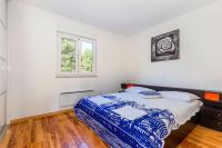Posteľ alebo postele v izbe v ubytovaní Apartment DARIO