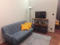Televízia a/alebo spoločenská miestnosť v ubytovaní Apartament Santo Bartolomeo