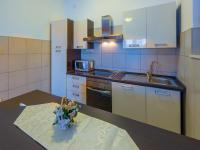 Kuchyňa alebo kuchynka v ubytovaní Apartment Agava