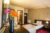 A bed or beds in a room at Hotel Villa Boyana - Free Parking
