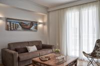 A seating area at Marvelous n Bright Apt next to Megaro Mousikis
