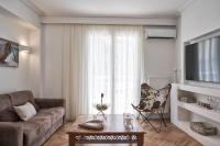 A seating area at Marvelous n Bright Apt next to Megaro Mousikis