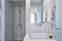 A bathroom at Marvelous n Bright Apt next to Megaro Mousikis