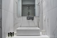 A bathroom at Marvelous n Bright Apt next to Megaro Mousikis