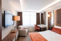 Postel nebo postele na pokoji v ubytování Sherry Suites Karaköy