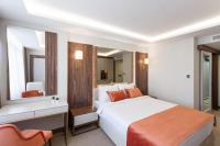 Postel nebo postele na pokoji v ubytování Sherry Suites Karaköy