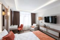 Postel nebo postele na pokoji v ubytování Sherry Suites Karaköy