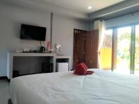 Ein Bett oder Betten in einem Zimmer der Unterkunft Chomview Resort
