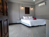 Ein Bett oder Betten in einem Zimmer der Unterkunft Chomview Resort