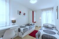 Posteľ alebo postele v izbe v ubytovaní Iris beach apartments