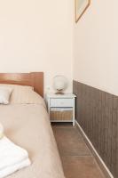 Posteľ alebo postele v izbe v ubytovaní Naiada Stomio-A apartment
