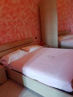 Posteľ alebo postele v izbe v ubytovaní Tivoli Medieval House