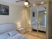 A bed or beds in a room at CASA TORRECILLA LINDA Adosado 2 Dormitorios a 50 metros de la Playa Torrecilla Nerja