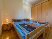 Posteľ alebo postele v izbe v ubytovaní Apartments ROKO