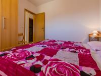 Posteľ alebo postele v izbe v ubytovaní Apartments ROKO