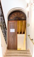 an entrance to a building with a wooden door at Guesthouse Ca&#39; San Marcuola 1 in Venice