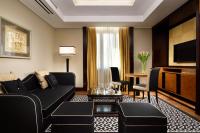 a living room with a couch and a table at Principi di Piemonte | UNA Esperienze in Turin