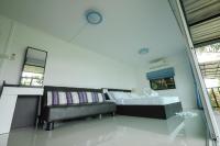 Postel nebo postele na pokoji v ubytování Saree Lagoon Villa Koh Samui
