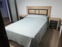 Posteľ alebo postele v izbe v ubytovaní Apartamentos Buena Vista 1