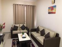 Posezení v ubytování Al Khaleej Plaza Furnished Apartments LLC