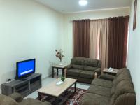 Posezení v ubytování Al Khaleej Plaza Furnished Apartments LLC