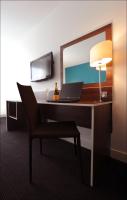 Heeton Concept Hotel - City Centre Liverpoolにあるテレビまたはエンターテインメントセンター