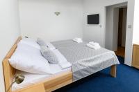Postel nebo postele na pokoji v ubytování Venclův statek